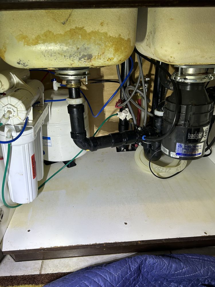 Double sink with Badger disposal and water filter system