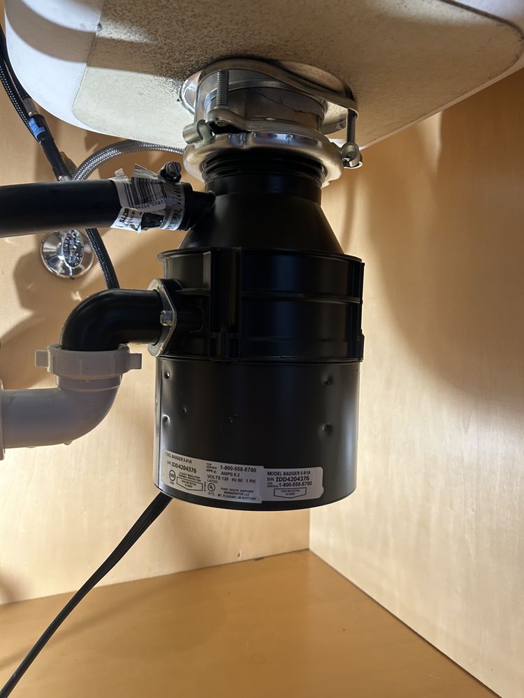 Badger garbage disposal replacement with clean connections
